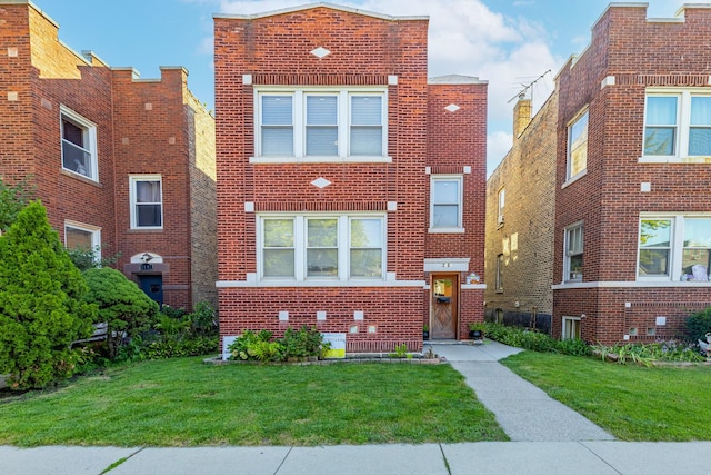 view of front of property featuring a front yard