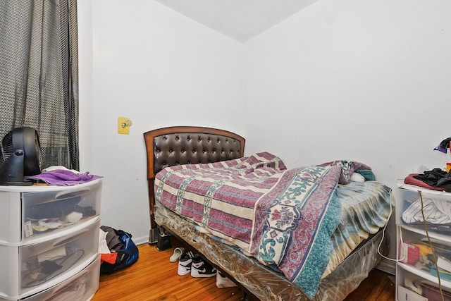 bedroom featuring hardwood / wood-style floors