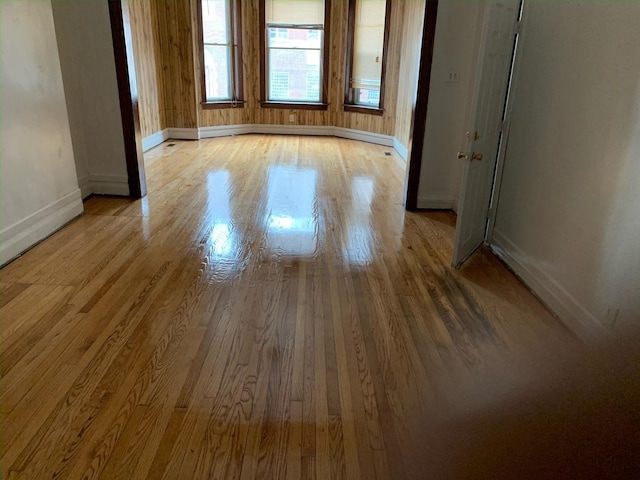 unfurnished room with light hardwood / wood-style flooring