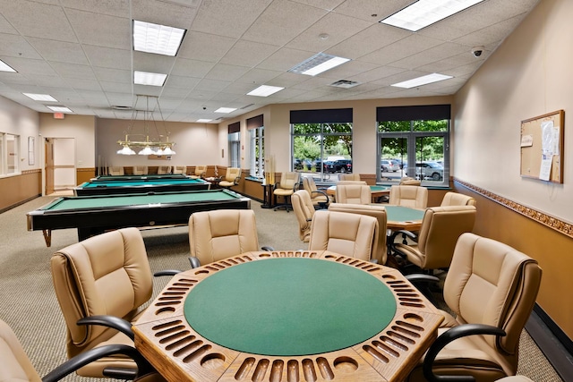 game room featuring pool table, a paneled ceiling, and carpet