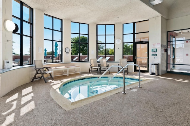 view of pool featuring an indoor in ground hot tub