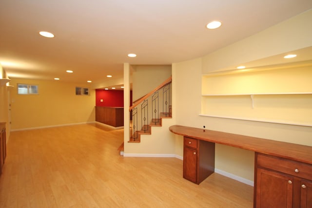 basement featuring light wood-type flooring