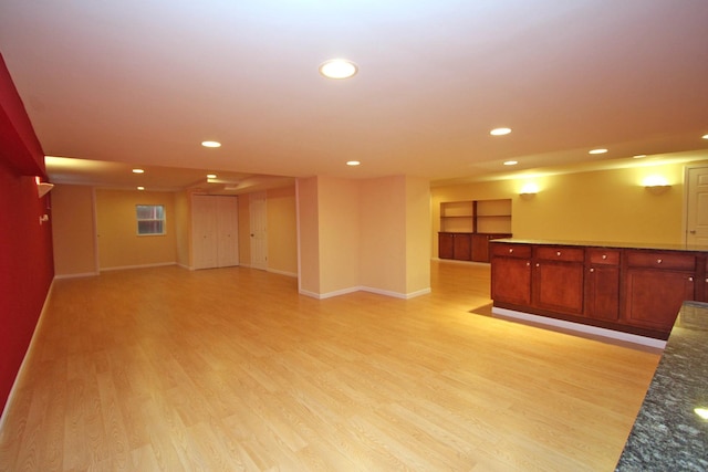 living room with light hardwood / wood-style flooring