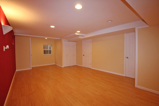 basement featuring wood-type flooring