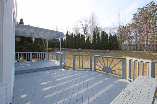 wooden deck with a yard