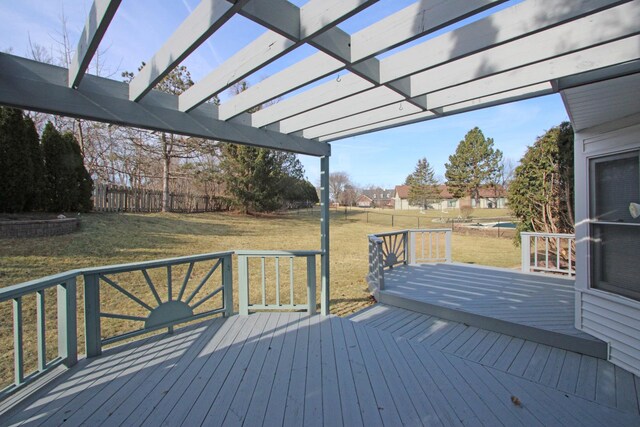 wooden terrace with a lawn