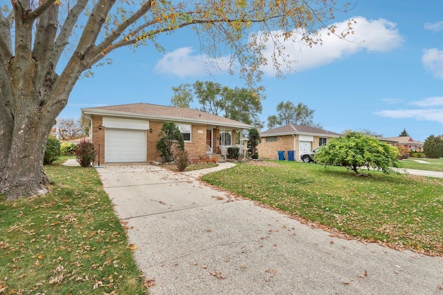 ranch-style home with a garage and a front lawn