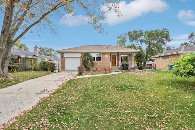 ranch-style home with a garage and a front lawn