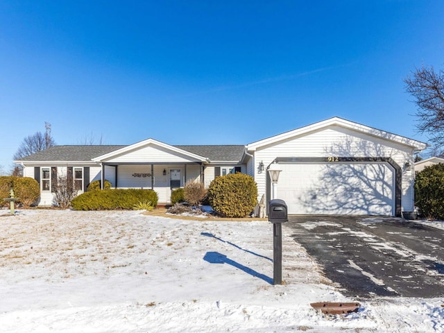 single story home featuring a garage