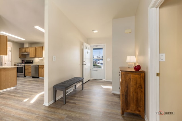 hall featuring light wood-type flooring