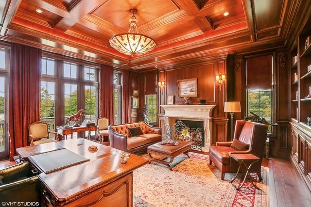 sitting room featuring wooden ceiling, coffered ceiling, crown molding, wood-type flooring, and wooden walls