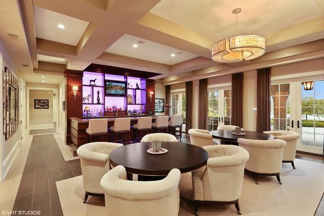 dining room featuring bar and french doors