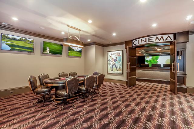 carpeted dining space featuring ornamental molding