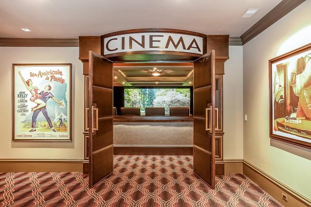 corridor with crown molding and carpet floors