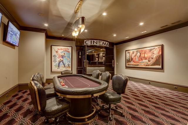 game room with carpet and ornamental molding