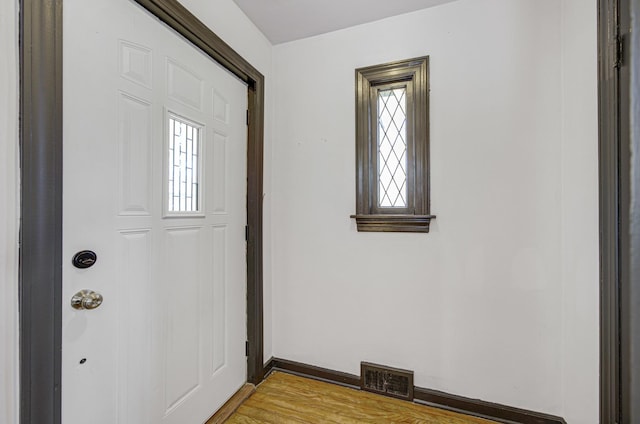 entrance foyer with light hardwood / wood-style flooring