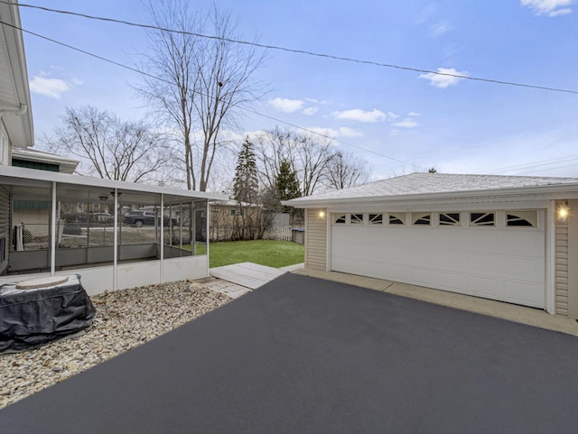 garage with a yard