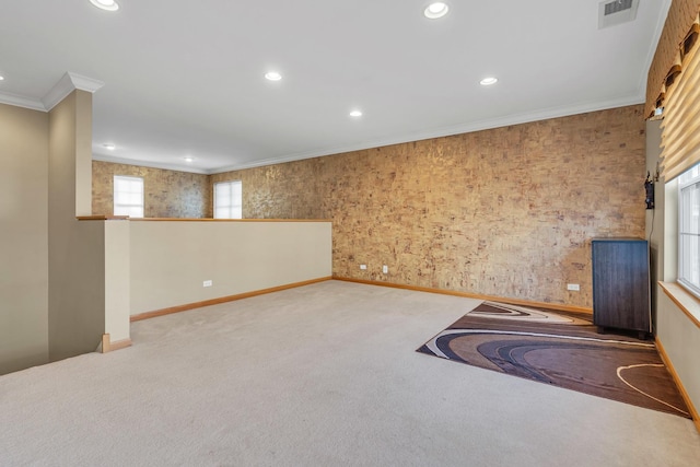 unfurnished room featuring carpet flooring and crown molding