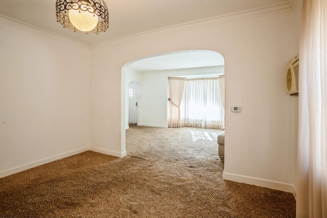 empty room with carpet flooring and ornamental molding