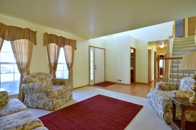 carpeted living room featuring a healthy amount of sunlight