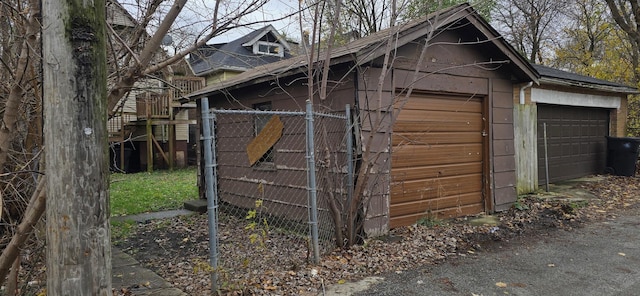 view of outbuilding with a garage