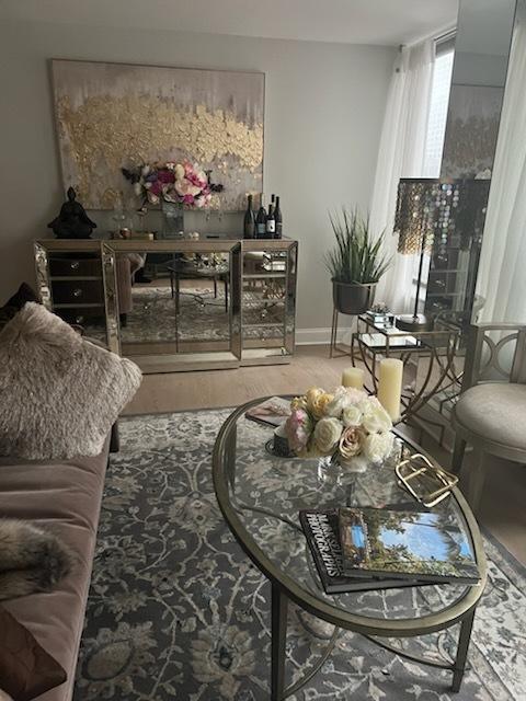 living area featuring hardwood / wood-style flooring