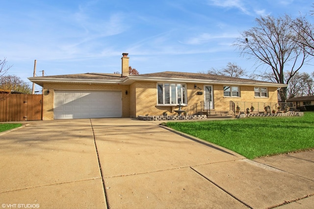 ranch-style house featuring a garage and a front yard