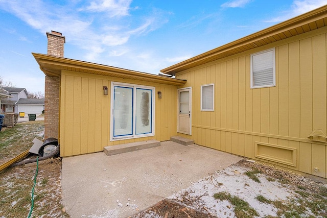 back of property featuring a patio