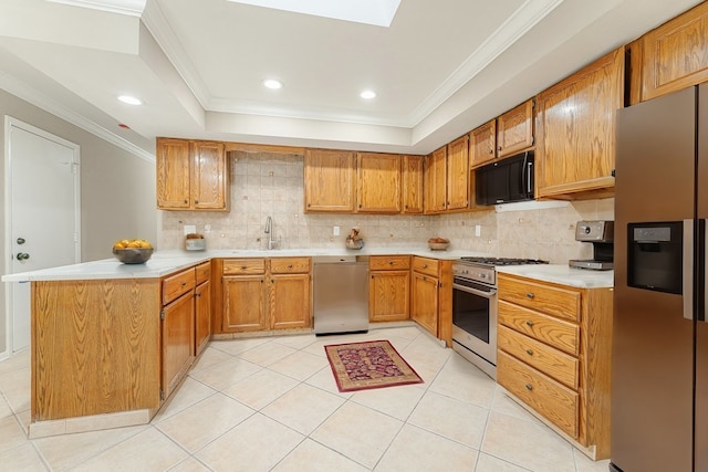 kitchen featuring sink, kitchen peninsula, decorative backsplash, light tile patterned floors, and appliances with stainless steel finishes