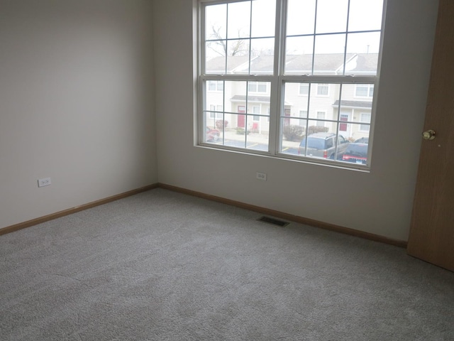 spare room with carpet flooring