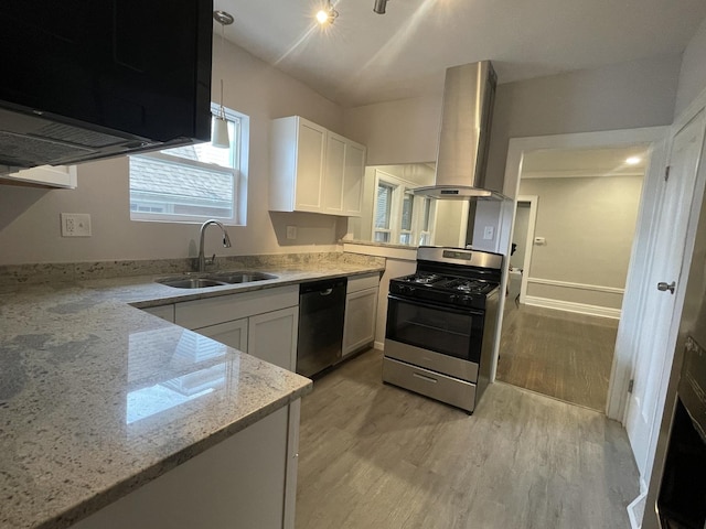 kitchen featuring gas stove, island range hood, sink, dishwasher, and white cabinetry