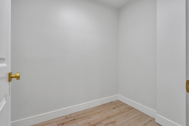 spare room with light hardwood / wood-style floors