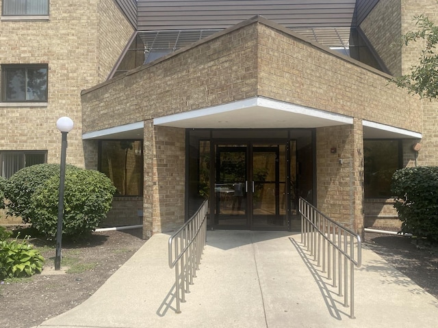 entrance to property featuring french doors