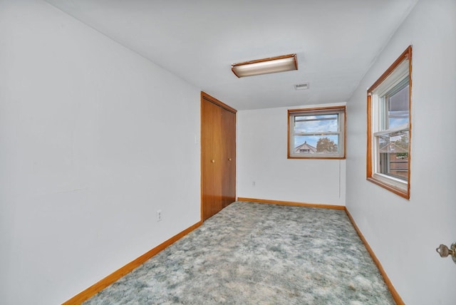 view of carpeted spare room