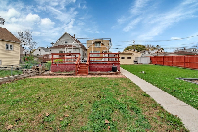 view of yard with a wooden deck