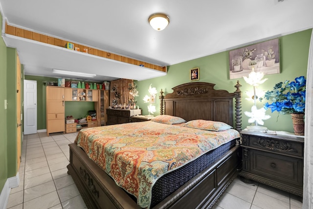 bedroom featuring light tile patterned floors