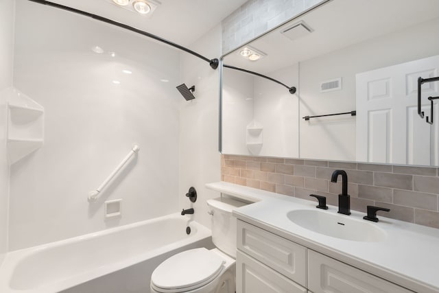 full bathroom with vanity, toilet, tub / shower combination, and decorative backsplash