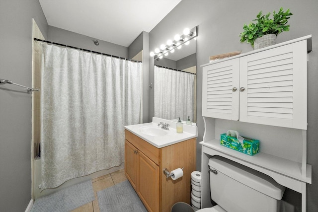 full bathroom featuring toilet, shower / bath combo, vanity, and tile patterned floors