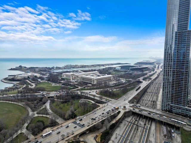 birds eye view of property featuring a water view