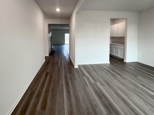 interior space with dark wood-type flooring