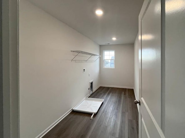 laundry area with washer hookup and dark wood-type flooring