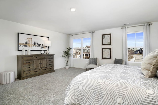 bedroom featuring light colored carpet