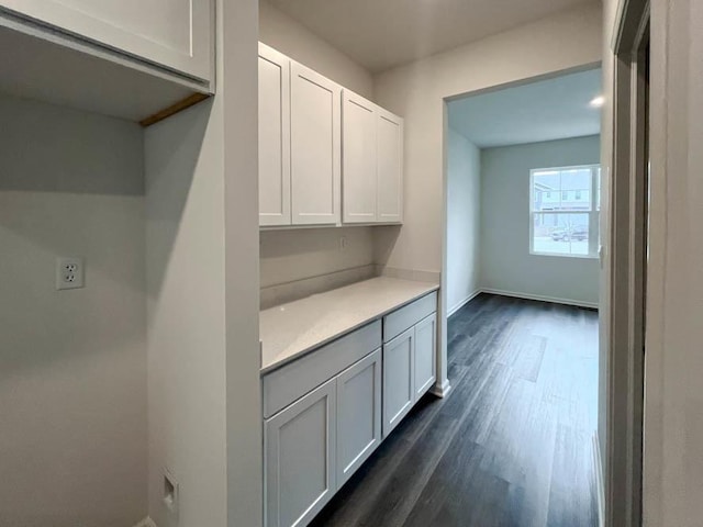 interior space with dark hardwood / wood-style floors