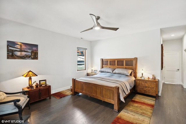 bedroom featuring ceiling fan and dark hardwood / wood-style flooring