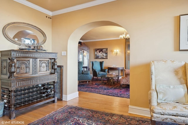 hallway featuring crown molding and hardwood / wood-style floors