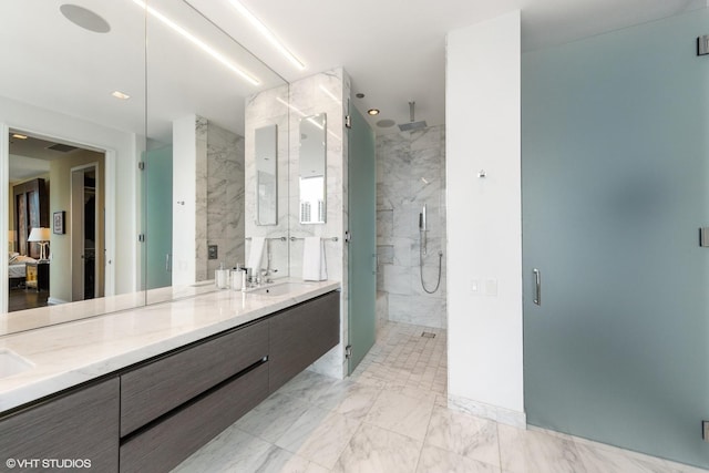 bathroom with vanity and an enclosed shower