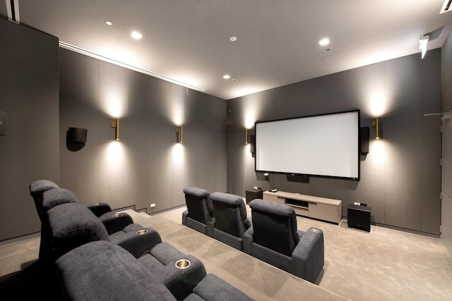 home theater featuring light colored carpet