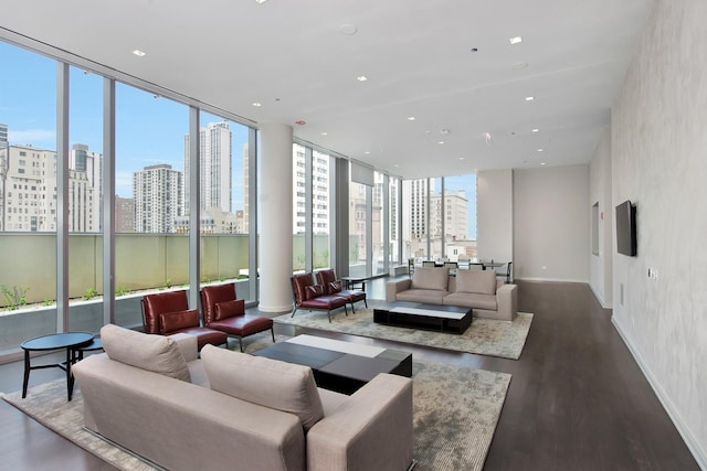 interior space featuring expansive windows and dark hardwood / wood-style flooring