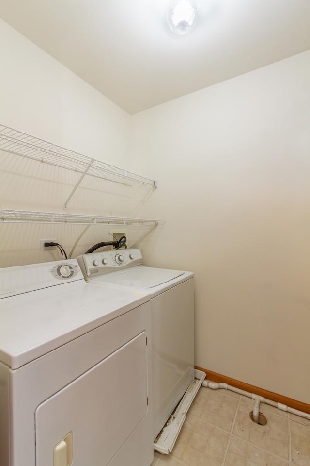 laundry room with washer and clothes dryer