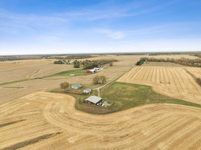 birds eye view of property with a rural view